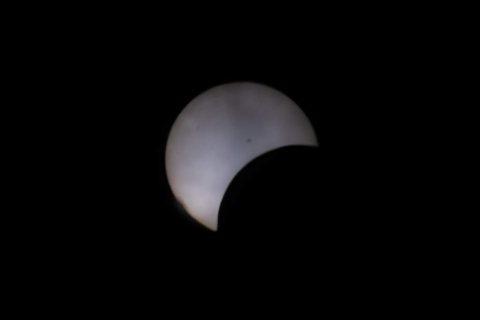 Partial Eclipse with clouds