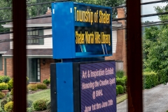 Your photographer is running out of creative ways to shoot the sign.