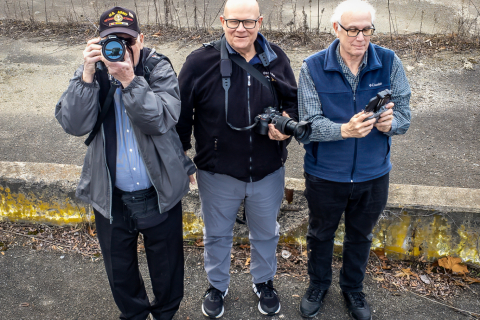 Three old guys with cameras